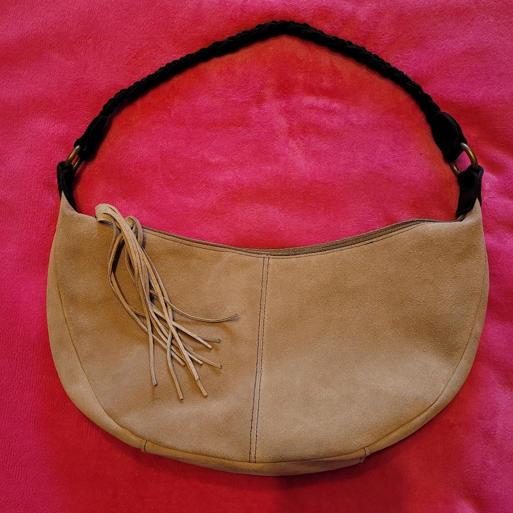 New without Tags. Super cute leather bag.